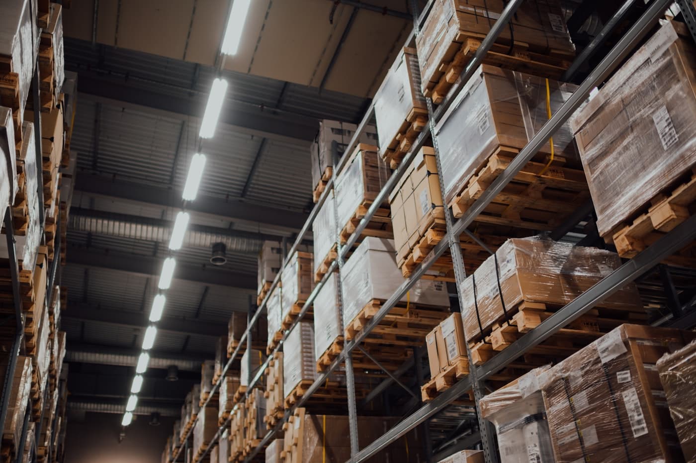 Brown RSC shipping boxes on a warehouse rack