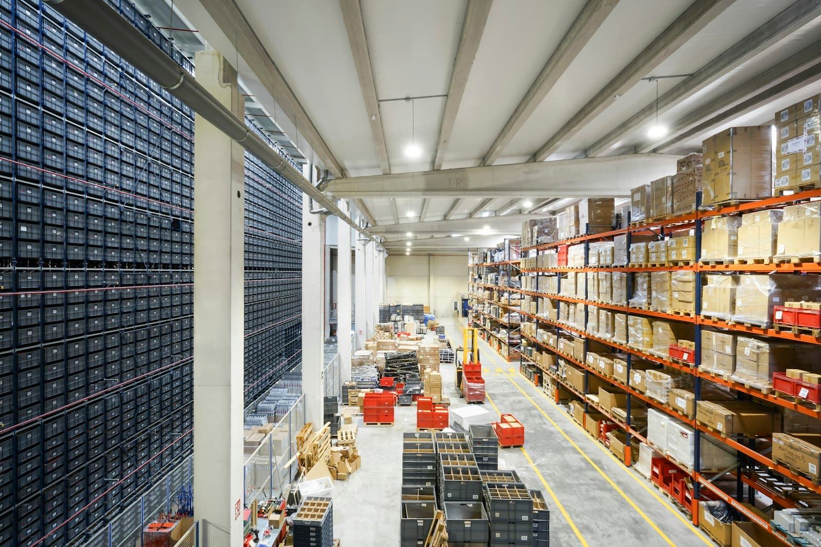 Large corrugated boxes stacked in an industrial warehouse